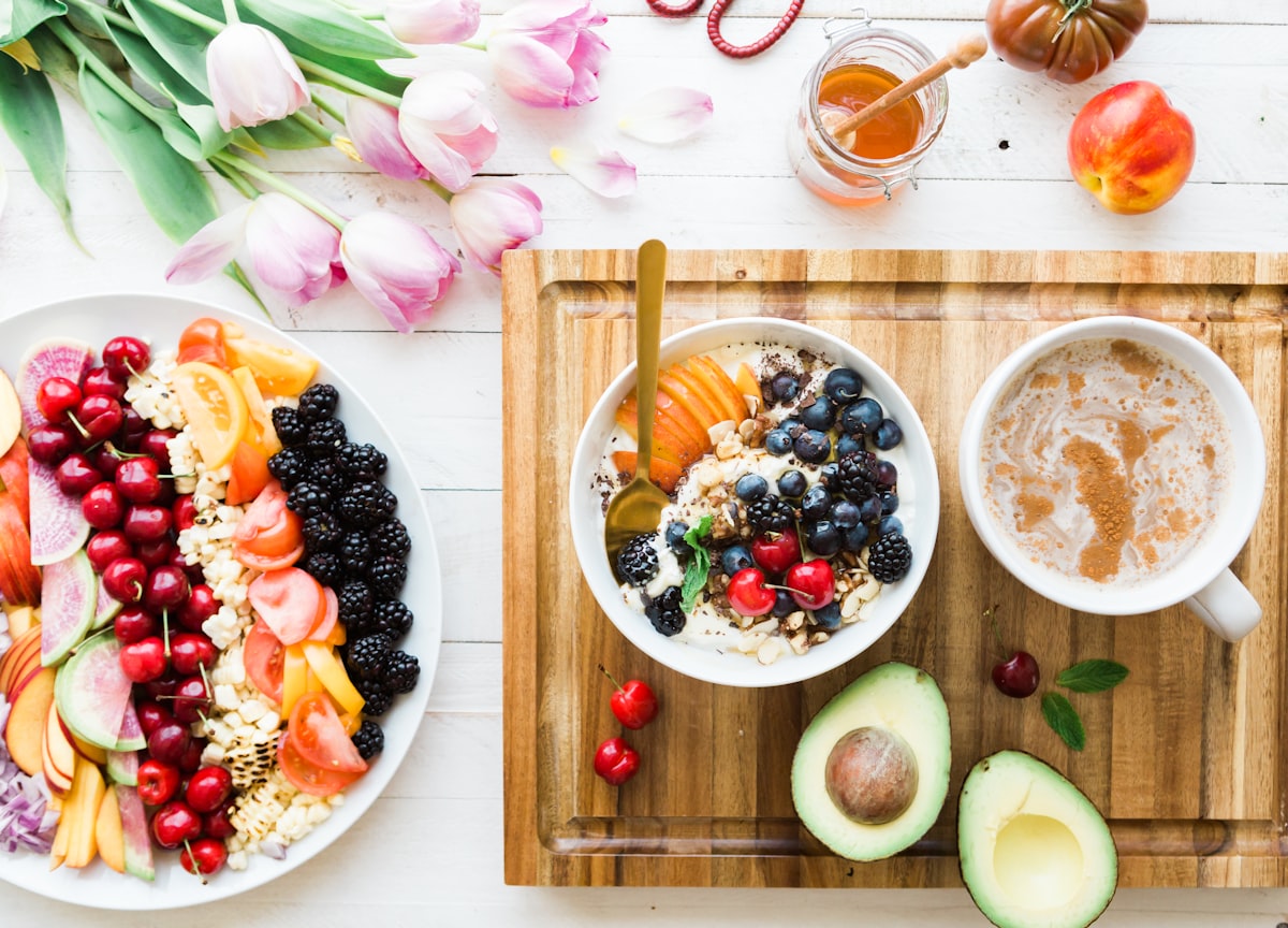 Healthy meal preparation with fresh ingredients on wooden surface